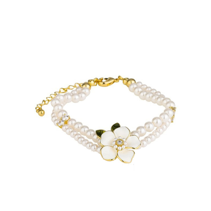 Collar, Pulsera o Pendientes Camelia Perla