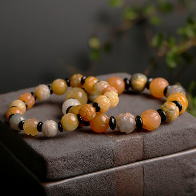 Golden Silk Jade Lotus Bead Bracelet
