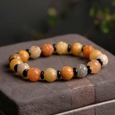 Golden Silk Jade Lotus Bead Bracelet