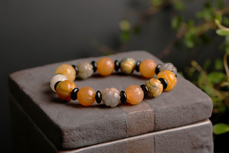 Golden Silk Jade Lotus Bead Bracelet