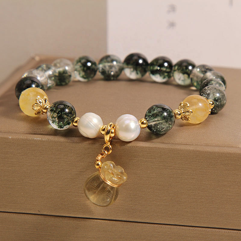 Pulsera de cristal natural con colgante de la suerte