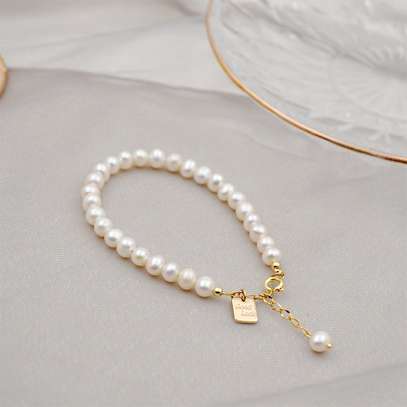 Pulsera de Perlas Naturales de Agua Dulce · Etiqueta de la Buena Suerte