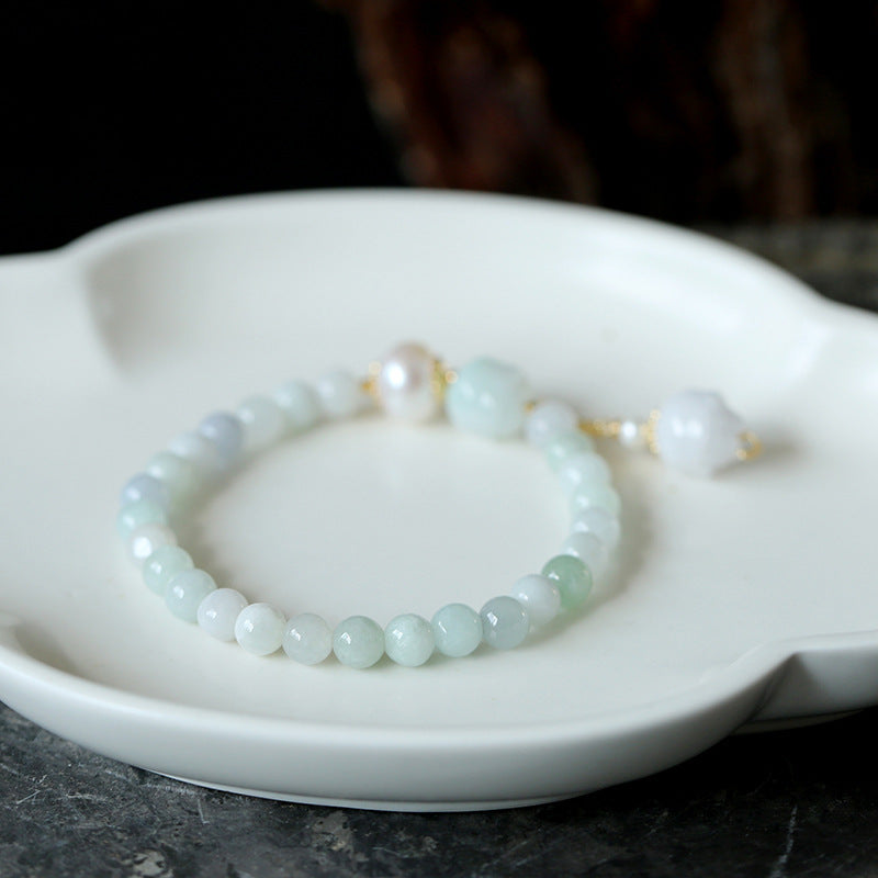 Pulsera de loto de esmeralda