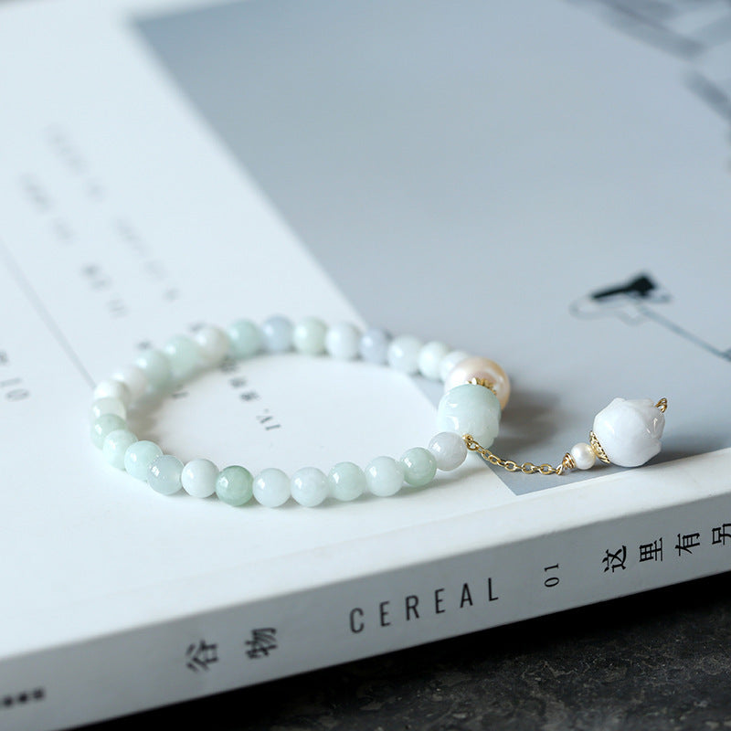 Pulsera de loto de esmeralda