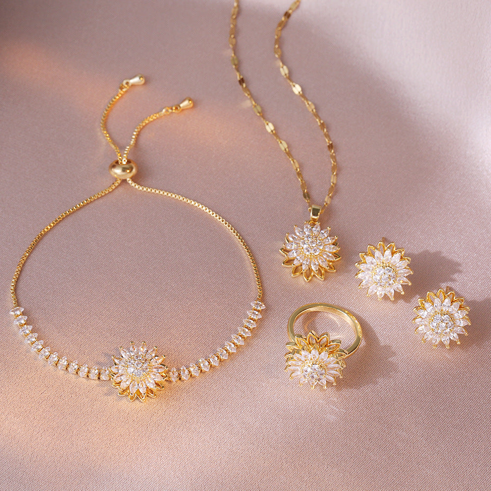 Collar, anillo, pendientes y pulsera de girasol de diamantes