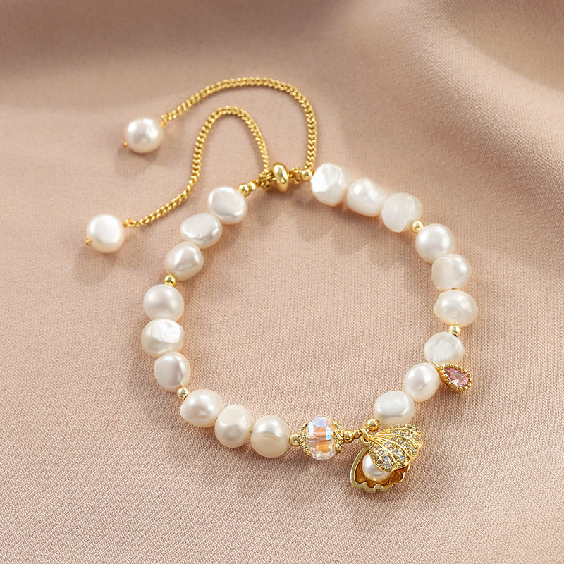 Pulsera de perlas naturales de agua dulce con colgante en forma de concha