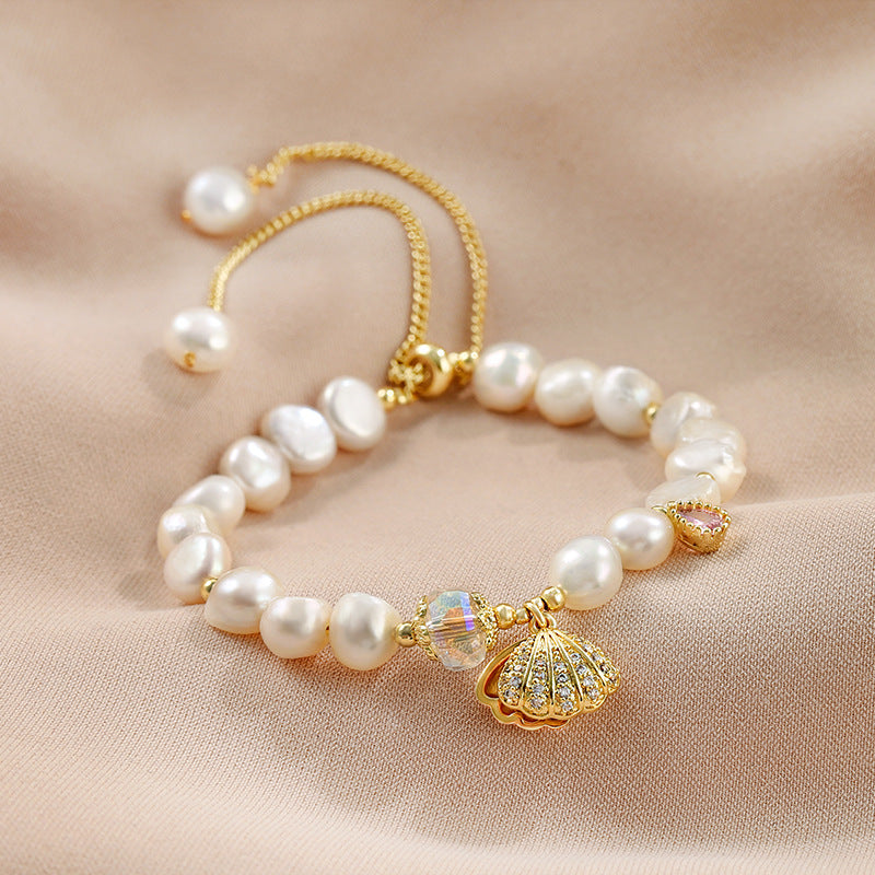 Pulsera de perlas naturales de agua dulce con colgante en forma de concha