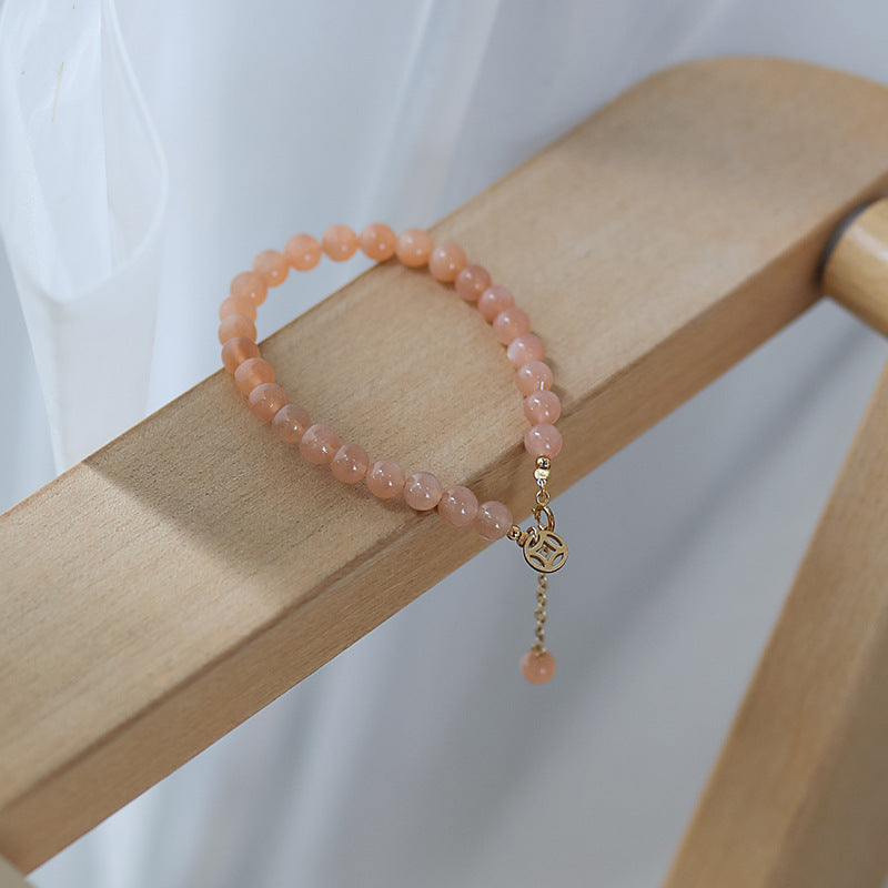 Pulsera de moneda de piedra solar naranja natural