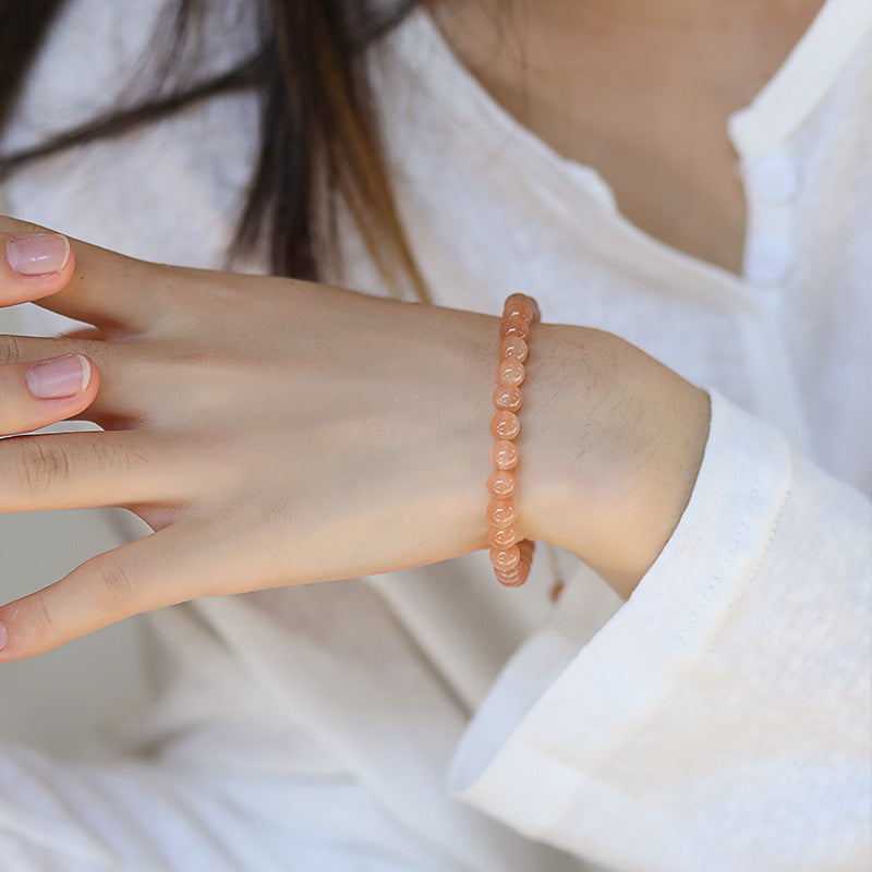 Pulsera de moneda de piedra solar naranja natural