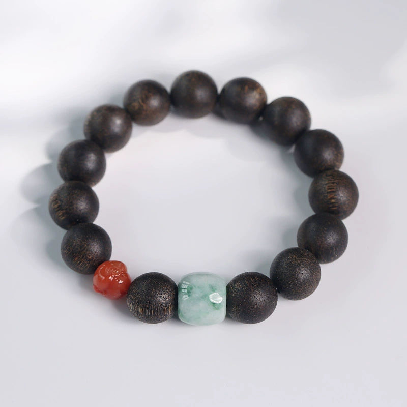 Pulsera de agarwood con mini Buda