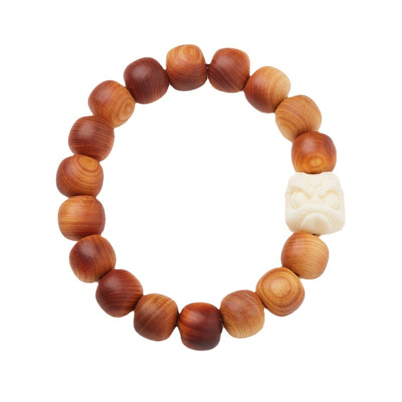 Pulsera de cuentas de tuya y león