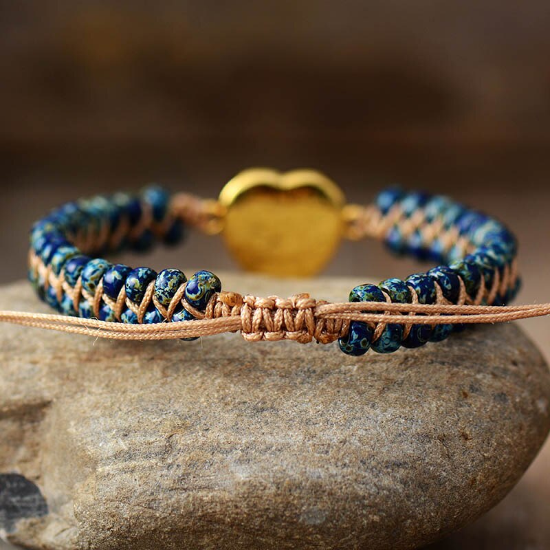 Pulsera trenzada con gema de corazón